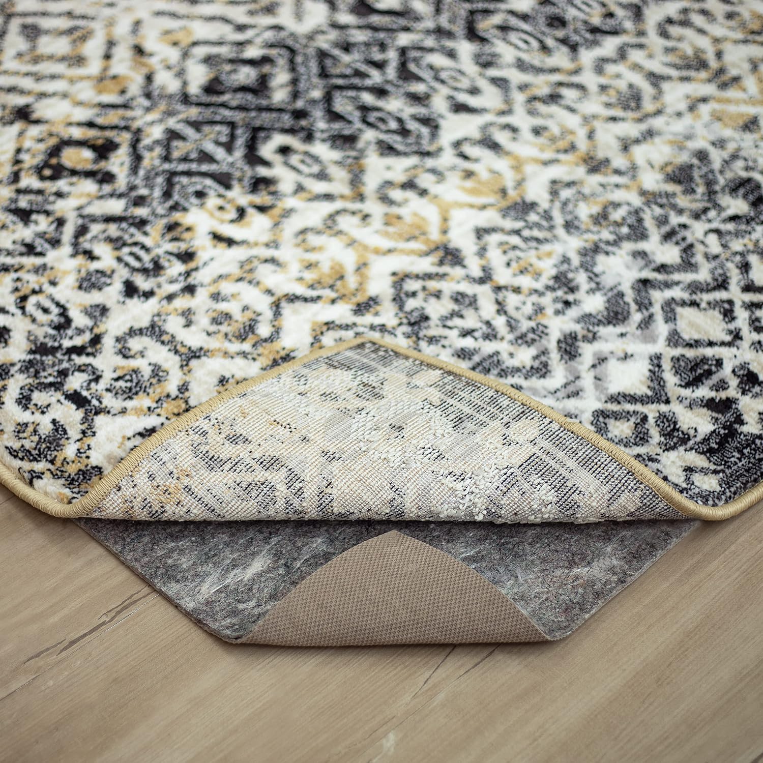 Mohawk Home 8' x 10' Non Slip Rug Pad Gripper 1/4 Thick Dual Surface Felt + Rubber Gripper - Safe for All Floors, Brown